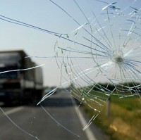 Window smashed in stone attack